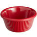 An Acopa red fluted melamine ramekin.