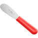 A Choice stainless steel sandwich spreader with a red handle.