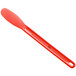 a red spoon on a white background