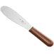 A Choice stainless steel sandwich spreader with a brown handle.