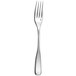 A silver Couzon by Amefa stainless steel table fork with a black handle.