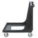 A black plastic Cambro Camdolly with wheels.