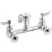 A silver Waterloo wall-mounted mop sink faucet with red and blue knobs.