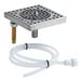 A stainless steel surface mount beer drip tray with a rinser and an attached hose.