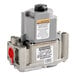 A close-up of a Main Street Equipment safety valve with a red button.