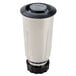 A stainless steel Hamilton Beach blender jar with a black lid.