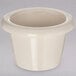 An ivory Carlisle smooth melamine ramekin with a round rim.