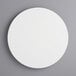 A 14" white circular melamine-coated wood cake board with feet.