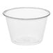 A clear plastic Dart souffle cup with a rim.
