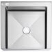A Regency stainless steel mop sink with a notched front and a hole in the center.