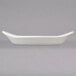 A white rectangular Hall China rarebit dish with a handle.