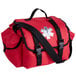 a red medical bag with a white symbol on it