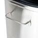 A close-up of a stainless steel Bunn iced tea dispenser.