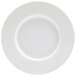 A white plate with a round rim.