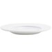 A Front of the House Monaco bright white porcelain plate with a wide rim.