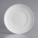 a white plate with a circular pattern