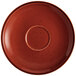 An Acopa Sedona orange stoneware saucer with a circle.