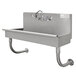 a stainless steel sink with a faucet