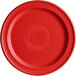 A close-up of an Acopa Capri Passion Fruit Red stoneware plate with a circular pattern.