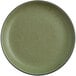 A close up of a moss green Acopa coupe plate with a brown rim.