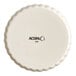 A round, vanilla-colored stoneware souffle or creme brulee dish with a fluted edge and the brand name 'Acopa' printed on the bottom.