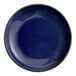 A round, blue porcelain coupe plate.