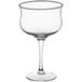 An Acopa Deco clear wine glass with a stem and curved rim.