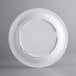 An Acopa Foundations white plate with a narrow rim.