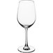 An Acopa Covella wine glass with a stem on a white background.