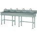 A 100" stainless steel multi-station hand sink with 5 faucets.