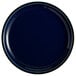 An Acopa Keystone Azora Blue stoneware coupe plate with a black rim.