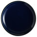 An Acopa Keystone Azora Blue stoneware coupe plate with a black rim.