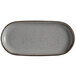 A rectangular gray stoneware platter with black specks.