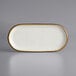 An Acopa Keystone stoneware oblong coupe platter with white rectangular plate with brown specks.