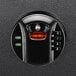 a black electronic lock with red light