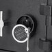 A black Barska steel depository safe with key locks on independent lockers.