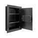 A black metal Barska recessed wall-mount safe with the door open.