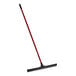A black and red squeegee with a long red handle.