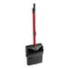 A black and red Libman lobby broom with a red handle and open-lid dustpan.