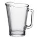 An Acopa clear glass pitcher with handle.