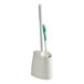 A white container with a green and white Libman toilet bowl brush and plunger.