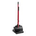 A red and black Libman lobby broom and dust pan.