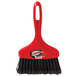 A red Libman whisk broom with black bristles and a black handle.