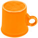 A small orange Fiesta mug with a handle.