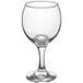 An Acopa clear wine glass.