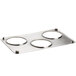 A silver metal adapter plate with four circles.