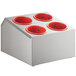 A silver stainless steel flatware organizer with red perforated plastic cylinders.