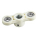 A white plastic replacement seat with three metal bearings designed for countertop bread slicers.