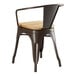 A Lancaster Table & Seating metal arm chair with a natural wood seat.