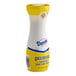 A Domino Quick-Dissolve Superfine Sugar canister with a yellow and blue label.